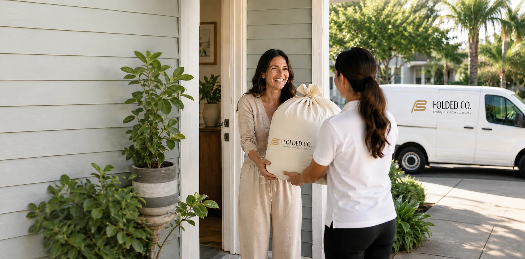 Folded Co Customer Laundry Bag Handoff Van